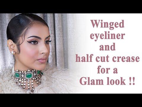 Winged eyeliner and half cut crease for a Glam look !!